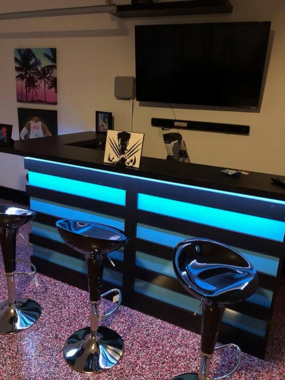 Man cave bar area with flake epoxy floor